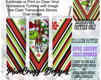 May include: A set of three skinny tumblers with a Christmas theme. The tumblers feature a Grinch design with the words "HO HO HO" and "Let's Get Lit". The design includes red, green, and black rhinestone patterns and snowflakes.