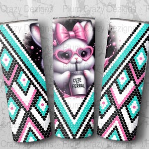 May include: Three stainless steel tumblers with a repeating geometric pattern in turquoise, pink, black, and white. The center tumbler features a white bunny wearing heart-shaped glasses and a pink bow, holding a drink that says "Cute But Ferral."