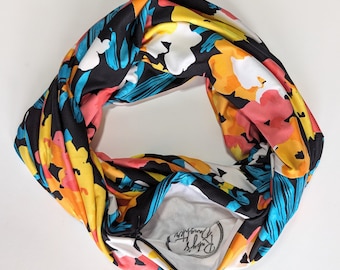 Vibrant floral infinity scarf with hidden zipper pocket.  Tropical leaf Print scarf. Double loop travel scarf.