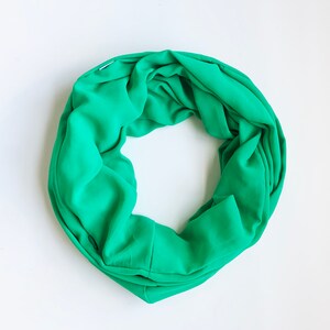 Infinity Scarf with hidden security pocket for valuables.  Apple Green Infinity scarf with hidden zipper pocket. Travel scarf