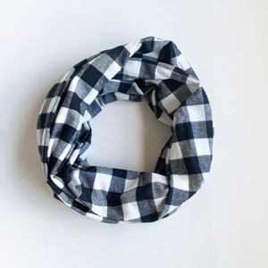 Infinity Scarf with hidden security pocket for valuables.  White and Black Buffalo Plaid Flannel Infinity Scarf with Hidden Zipper Pocket.