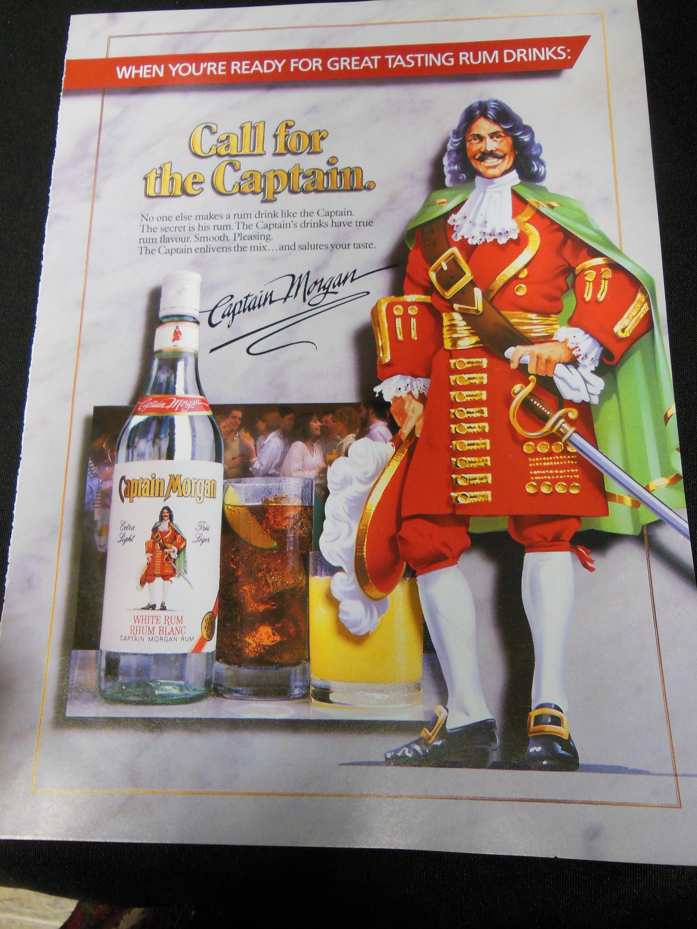 Vintage 1980s De Luxe Rum Captain Morgan Rhum in gold & dark 8 by 11 ready for framing inexpensive shipping, magazine ad