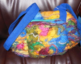 Hand Felted, Colourful, yarn embellishments, secure snap closure purse, melton wool body, 10 inches deep, 14 inches to 9 inches wide at base