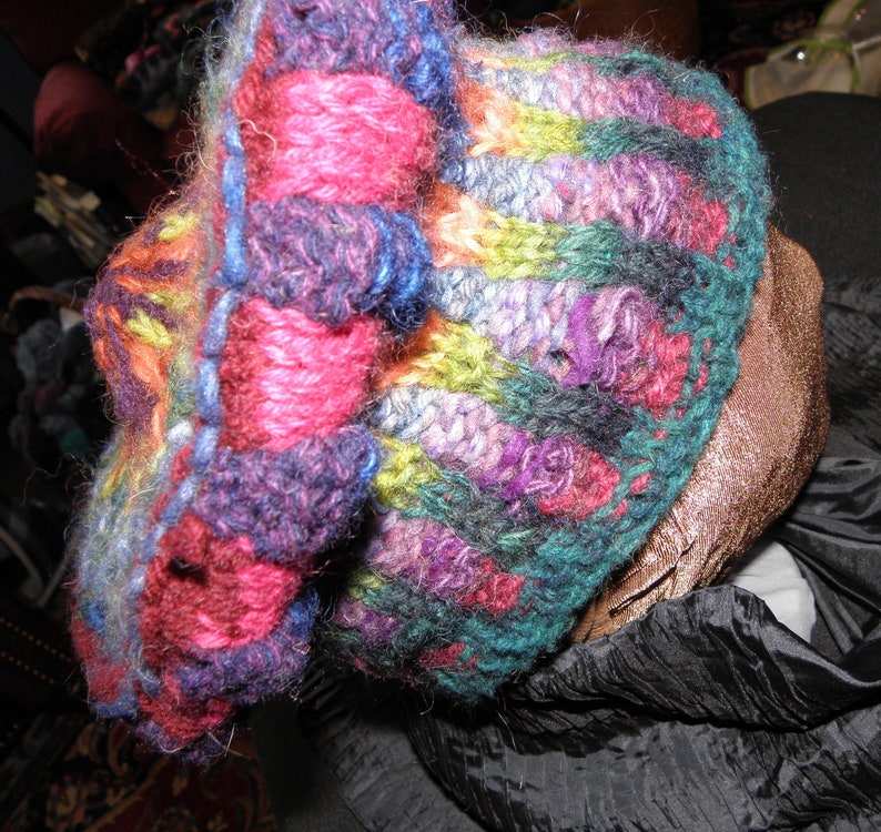 this unusual slouchy star medallion topped wool hat is very original Hand knitted with hand dyed wool FREE shipping in NA