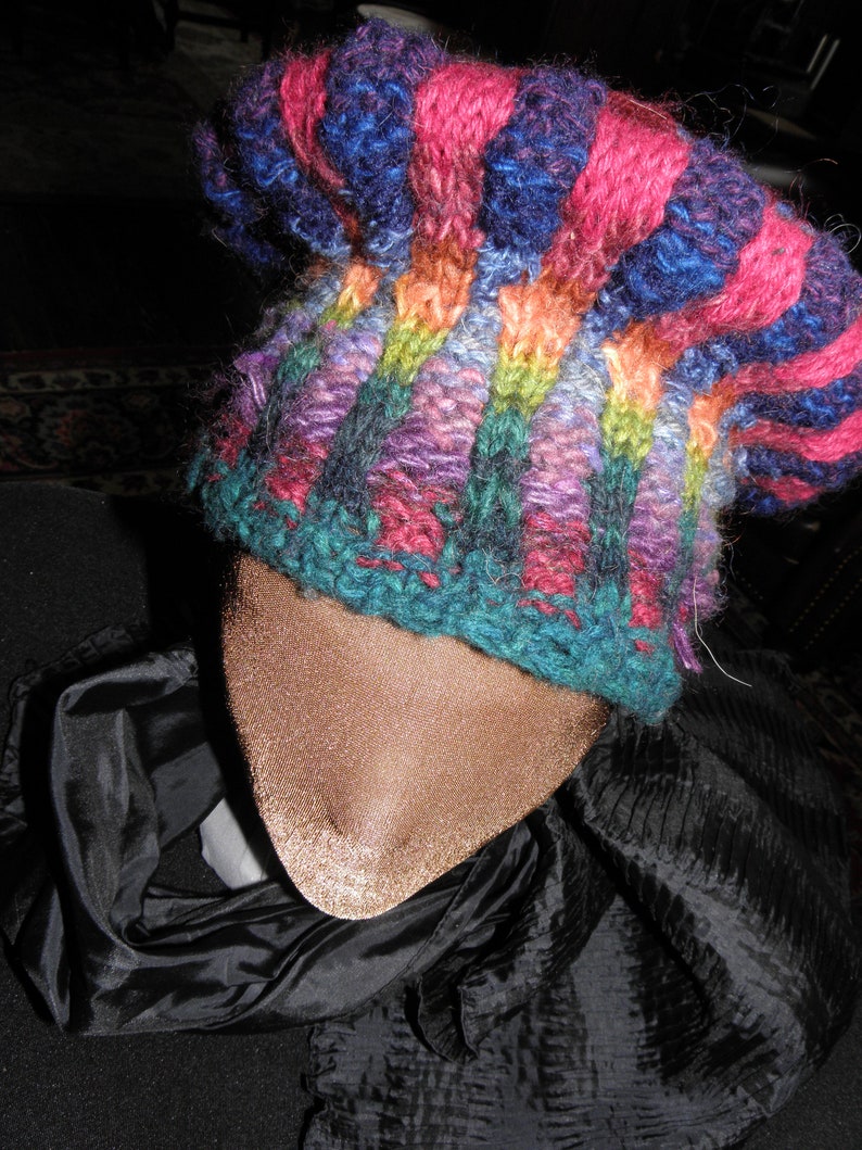 this unusual slouchy star medallion topped wool hat is very original Hand knitted with hand dyed wool FREE shipping in NA