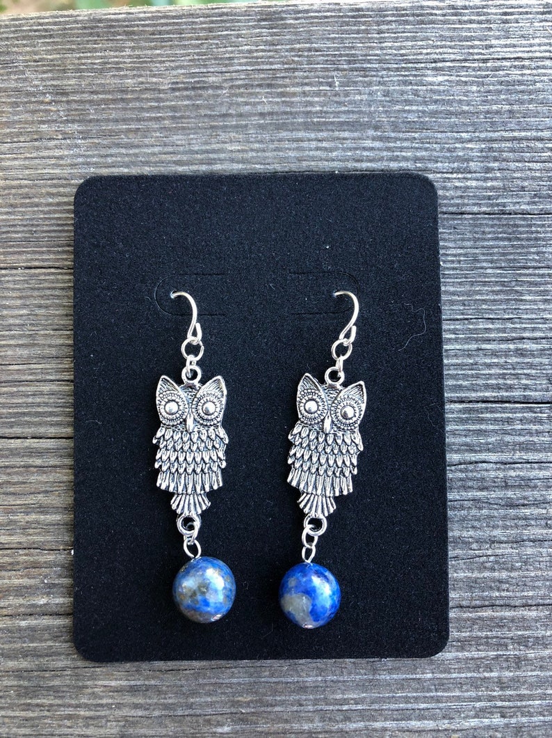 Owls carrying Lapis Gemstones