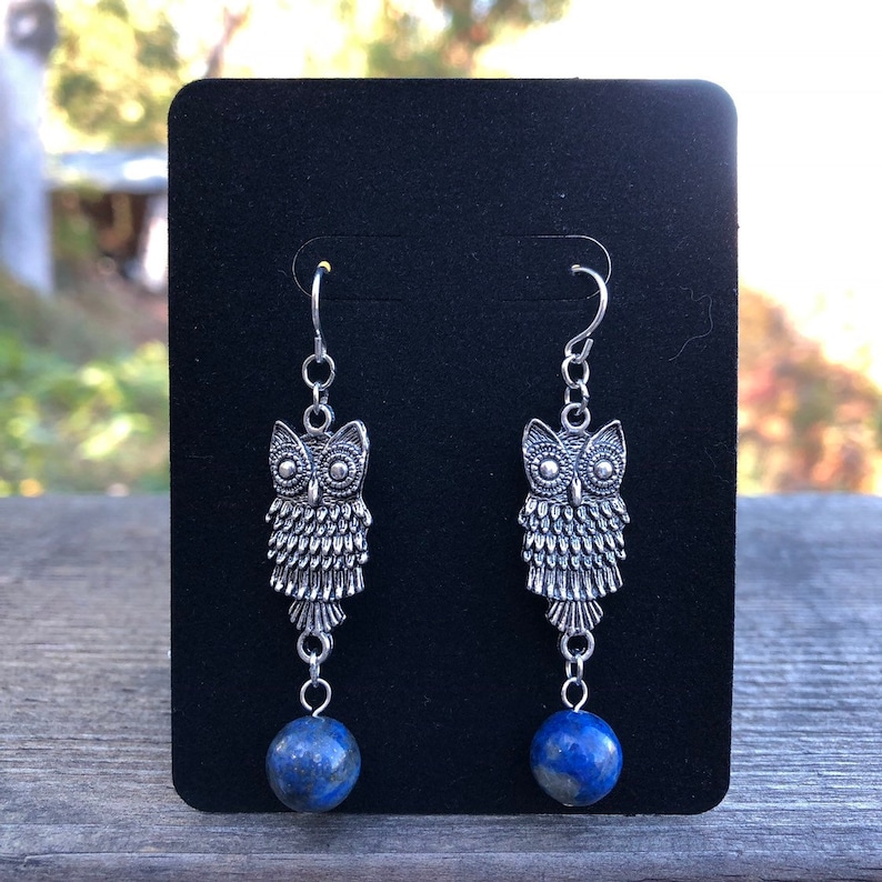Owls carrying Lapis Gemstones