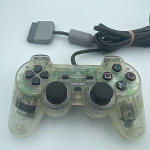 Manette DualShock transparente pour PlayStation 1 SCPH-1200 PS1 officielle et authentique OEM