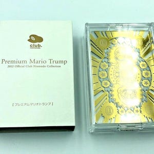 Cartes à jouer Mario Trump Premium Club Nintendo dorées et transparentes en promotion