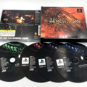 Puede incluir: Un juego completo de "The Legend of Dragoon" para PlayStation. El juego incluye la caja original, cuatro discos de juego y la contraportada del juego. El título del juego se muestra en la caja y los discos.