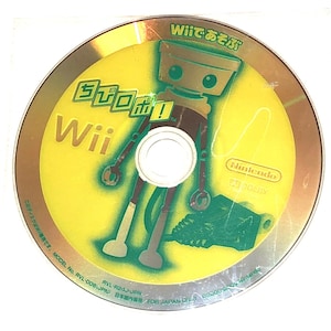May include: A yellow Wii game disc with a cartoon robot illustration and Japanese text. The disc features the word "Wii" in white and the Nintendo logo. The disc is a video game.