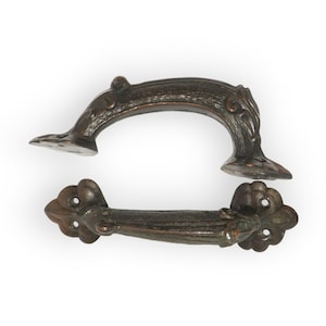 Vintage metal door handles in brass color, pair of retro massive door knobs