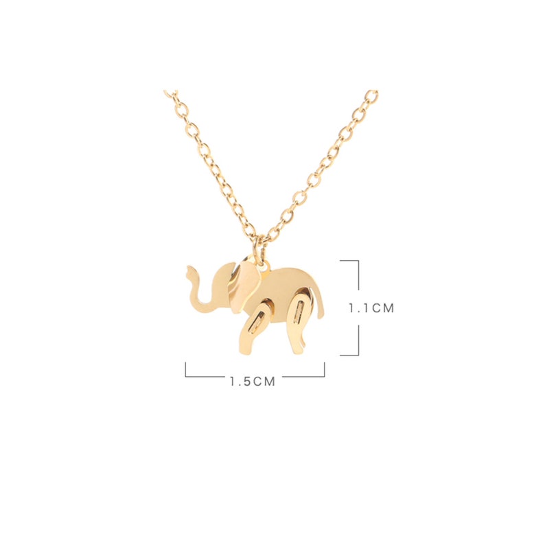 May include: Gold-colored elephant pendant necklace. The elephant charm is 1.5 cm long and 1.1 cm high. The necklace has a delicate chain and a simple design. The elephant has cut-out details.
