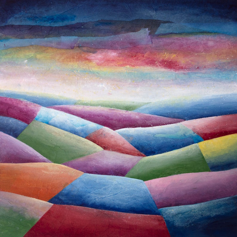 May include: Abstract painting depicting a colourful landscape with a patchwork of hills in shades of blue, green, purple, red, and orange. The sky is a dark blue with hints of pink and yellow.