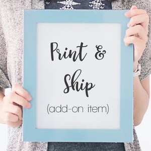 May include: A person holding a light blue picture frame with the text "Print & Ship (add-on item)" in black lettering.