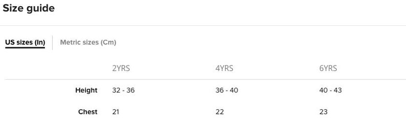 May include: Size guide for children's clothing in US sizes and metric measurements. The table shows height and chest measurements in inches and centimeters for sizes 2, 4, and 6 years.