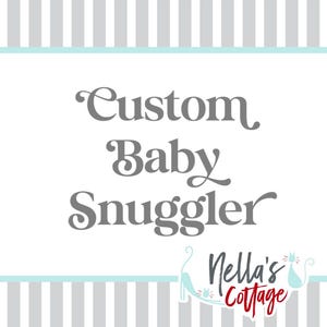 May include: A white and gray striped background with a light blue stripe across the top and bottom. The text "Custom Baby Snuggler" is in gray text with a stylized font. The text "Nella's Cottage" is in red text with a stylized font and a small cat illustration.