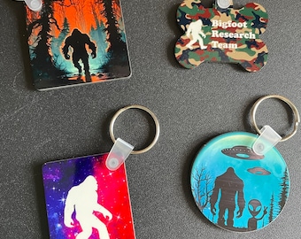 Bigfoot keychains - Alien, Believe, orange swamp, dog tag - choose your design