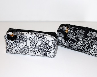 Trousse scolaire maquillage en similicuir noir et fleurs exotiques