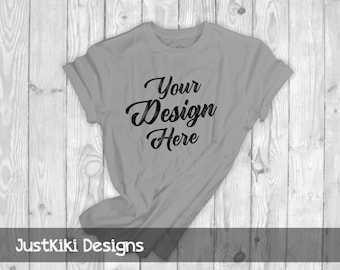 Download Free T Shirt Mockup Flat Lay Shirt Gray Shirt Mock Up White Wood Background Gray Swoop Shirt Best Poster Mockups PSD Mockup Template