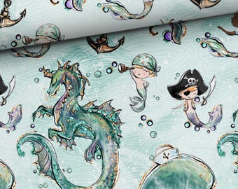 May include: A light blue fabric with a repeating pattern of mermaids, anchors, and sea creatures. The mermaids are depicted in various poses, some with pirate hats and spyglasses. The anchors are brown, and the sea creatures are green and purple.
