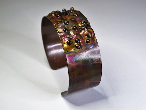 Copper Bracelet flame painted, purple hue. The cuff is flame painted with a torch and covered by a protective coat, fire painting,