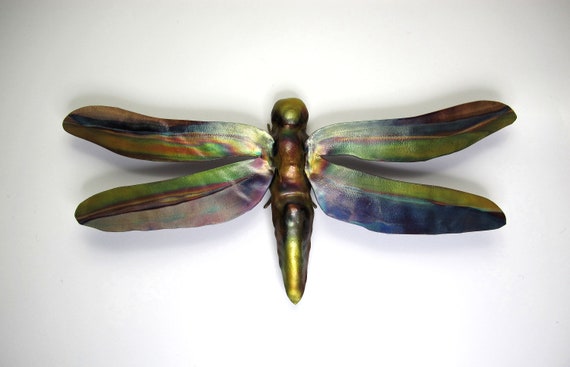 Flame painted copper dragonfly, a decorative object for the wall or on a piece of furniture.