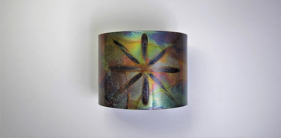 Copper Bracelet flame painted. The cuff is flame painted with a torch and covered by a protective coat
