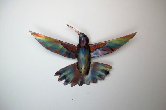 Flame painted copper Hummingbird, a decorative object.