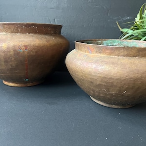 May include: A rustic wooden sign with the text "Welcome to our home" in a handwritten style. The sign features a distressed finish and a simple, inviting design, perfect for a front porch or entryway.