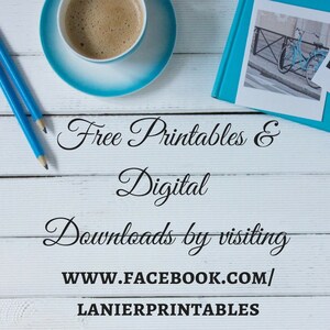May include: A white wooden background with a blue cup of coffee, two blue pencils, and a blue notebook with a photo of a bicycle. The text "Free Printables & Digital Downloads by visiting WWW.FACEBOOK.COM/LANIERPRINTABLES" is written in black cursive.