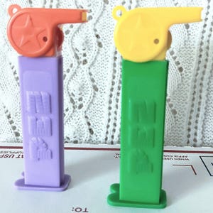 Vintage PEZ Dispensers  Set of 2 Whistle Head With Feet