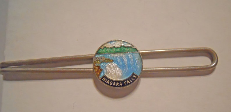 Unique Niagara Falls Oar Tie Bar Tie Bar Silver Tone Metal Niagara Falls Enameled Round Emblem in the Center