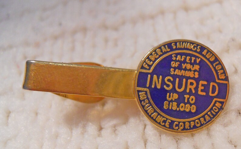 INSURED Up to 15,000 Tie Bar Safety of Your Savings Gold Tone Metal Company Tie Bar Federal Savings and Loan Insurance Corporation