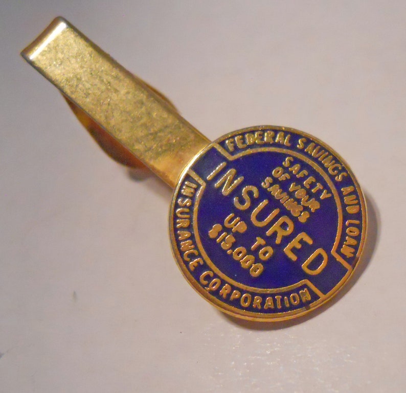 INSURED Up to 15,000 Tie Bar Safety of Your Savings Gold Tone Metal Company Tie Bar Federal Savings and Loan Insurance Corporation