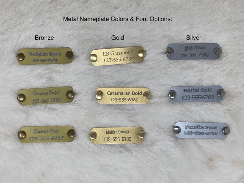 May include: Image showcasing metal nameplate color and font options. Bronze, gold, and silver nameplates are displayed, each with different fonts and text, including phone numbers. The text "Metal Nameplate Colors & Font Options" is visible.
