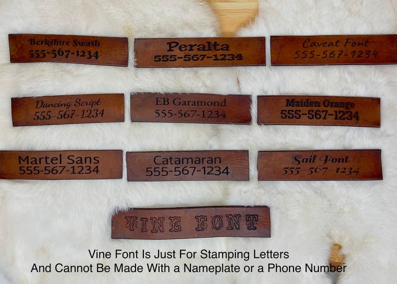 May include: A collection of brown leather nameplates with various font styles, each displaying a name and phone number. The fonts include Berkshire Swash, Peralta, Caveat Font, Dancing Script, EB Garamond, Maiden Orange, Martel Sans, Catamaran, and Sail Font.