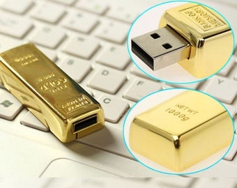 1 GOLD 8 GB USB KEY.