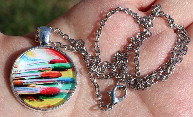 Tibetan silver Photo glass Cabochon pendant. Brushes with chain