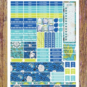 May include: A set of colourful planner stickers with a blue, green and white floral pattern. The stickers include phrases such as "To Do", "Today", "Little Things", "Hydrate", "Cancelled", "Don't Forget", "Pay Day", and "Work Out".