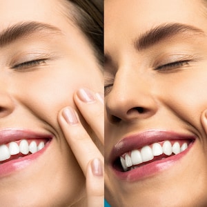 May include: A close-up of a smiling person with closed eyes. The person's hand gently touches their cheek. The person has full, glossy lips and bright white teeth. The skin tone is fair, and the overall image has a soft, natural aesthetic.