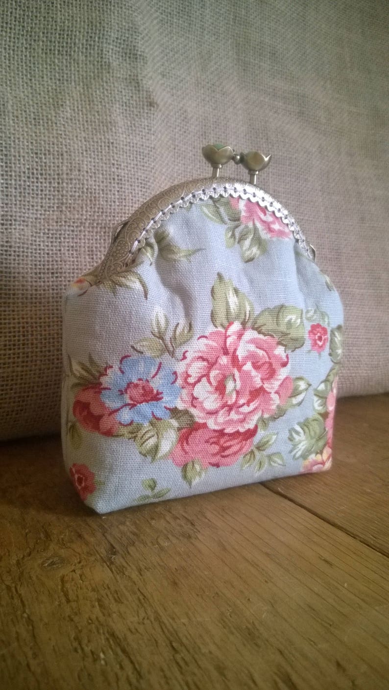 Purse with flower detail. with added lace detail Hand Made coin purse made with a sew in purse frame