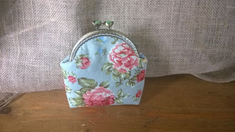 Purse with flower detail. with added lace detail Hand Made coin purse made with a sew in purse frame
