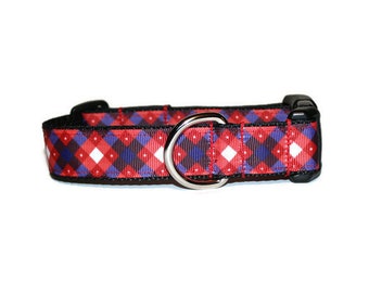 May include: A red, white, and blue plaid dog collar with a black buckle and silver D-ring.