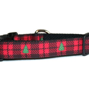 May include: Red and black tartan dog collar with green Christmas trees.