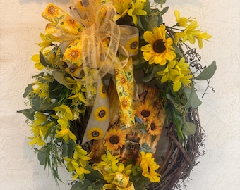 Girasol y mariposa de metal con tarro de cristal