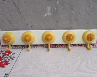 Perchero de plástico vintage para toallas: decoración de cocina retro