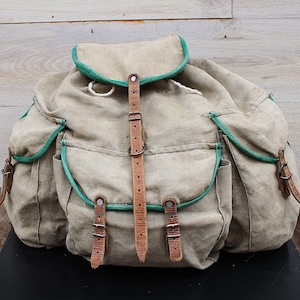 Vintage Canvas Tourist Backpack: Military Khaki Leather Straps, Large Rucksack