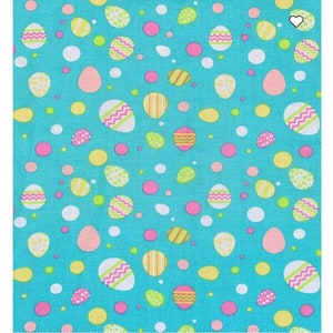 May include: A turquoise fabric with a repeating pattern of pastel pink, yellow, and green Easter eggs and dots.