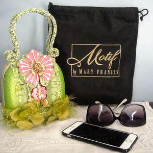 Another great Mary Frances purse that is a must have for Spring